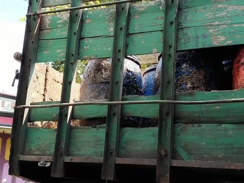 Central Java Indonesia 10 June 2026: truck carrying multiple drums filled Stock Photos