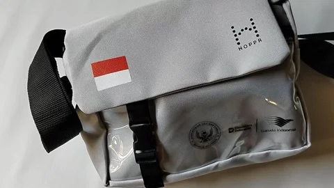 Central Java Indonesia 10 May 2026: Indonesian Hajj sling bag 2026 designed for  Stock-Footage 334712609