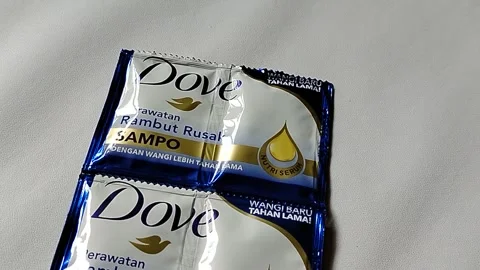 Central Java, Indonesia – 10 May 2026: Detailed image of Dove hair shampoo  Stock Footage 337081506