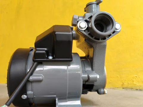 Central Java Indonesia 11 August 2026: A gray and black electric water pump with Stock-Fotos
