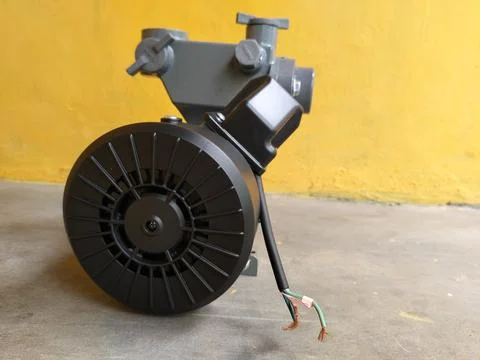 Central Java Indonesia 11 August 2026: A gray and black electric water pump with Stock Photos