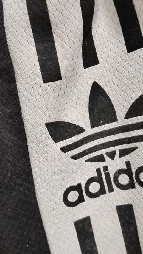 Central Java Indonesia 12 July 2026: Close-up of a branded athletic jersey showc Stock Footage 339320664