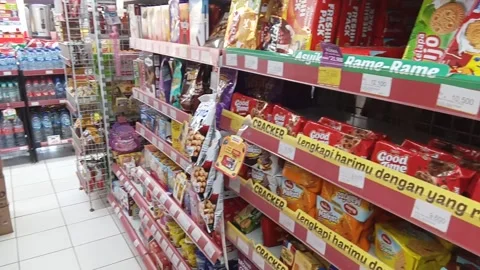 Central Java Indonesia 12 June 2024: food and beverage shelves etc. Stock Footage 277519628