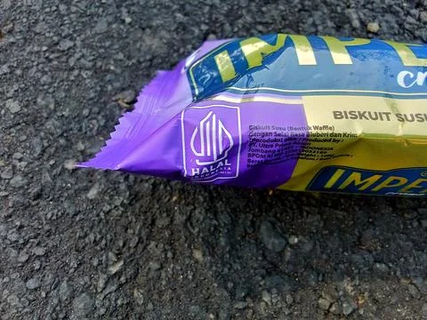 Central Java Indonesia 12 June 2024: halal logo on biscuit bread packaging. Фото
