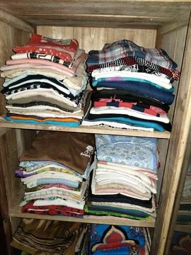 Central Java Indonesia 12 June 2026: Stacks of clean folded clothes stored  Stock Photos