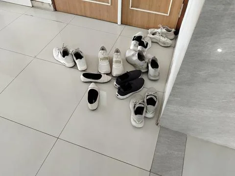 Central Java Indonesia 12 September 2026: A messy pile of various shoes  스톡 사진