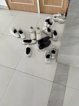 Central Java Indonesia 12 September 2026: A messy pile of various shoes  스톡 사진
