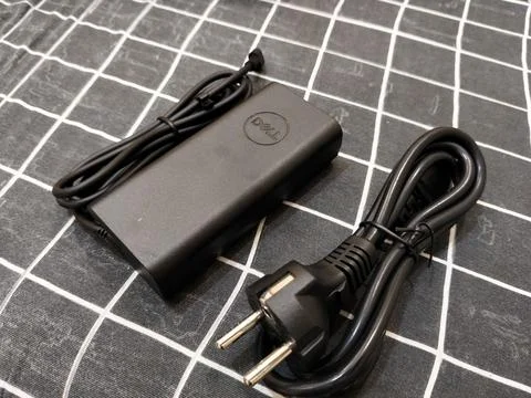 Central Java Indonesia 13 June 2026: A Dell laptop charger with AC power adapter Stock-Fotos