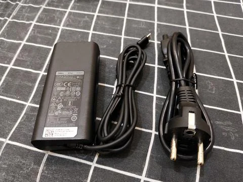 Central Java Indonesia 13 June 2026: A Dell laptop charger with AC power adapter Stock-Fotos