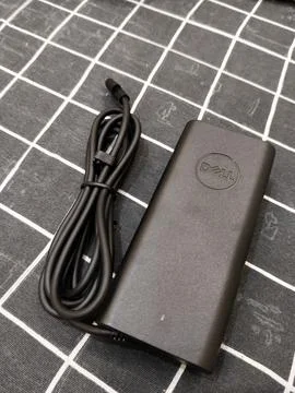 Central Java Indonesia 13 June 2026: A Dell laptop charger with AC power adapter Stock-Fotos