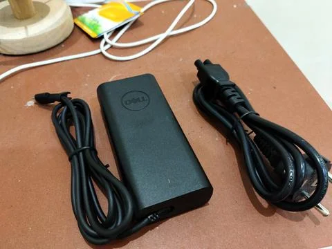 Central Java Indonesia 13 June 2026: A Dell laptop charger with AC power adapter Stock-Fotos