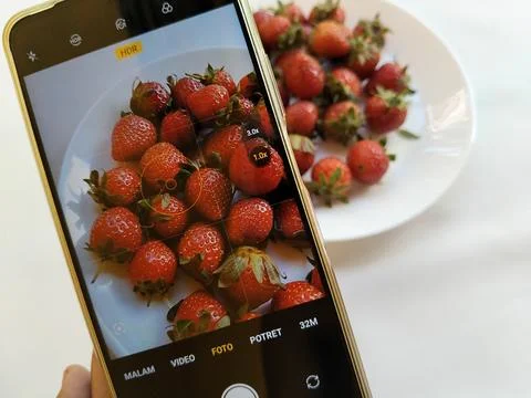 Central Java Indonesia 13 May 2026: A smartphone camera capturing Stock Photos