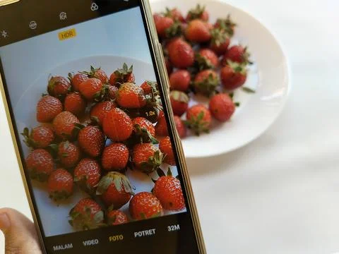 Central Java Indonesia 13 May 2026: A smartphone camera capturing Stock Photos
