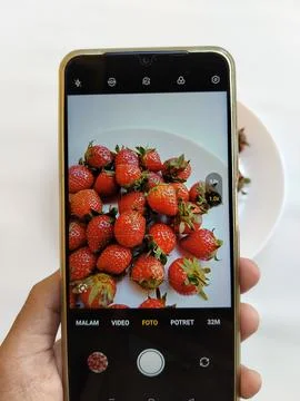 Central Java Indonesia 13 May 2026: A smartphone camera capturing Stock Photos