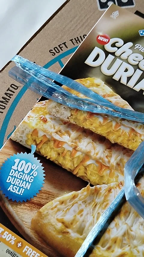 Central Java Indonesia 16 August 2026: A Domino's Pizza cardboard delivery box  Stock Footage 342534273