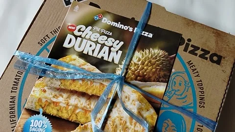 Central Java Indonesia 16 August 2026: A Domino's Pizza cardboard delivery box  Stock Footage 342534282