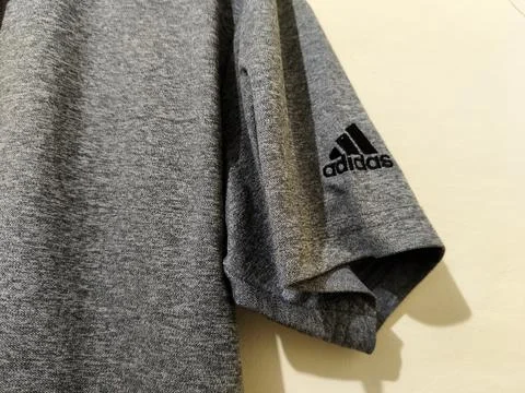Central Java Indonesia 16 August 2026: Close-up of a gray Adidas collared polo  Stock Photos