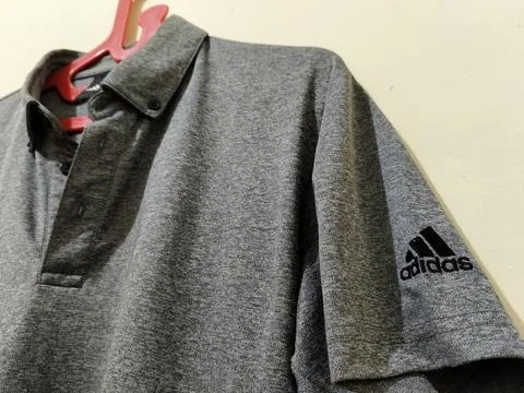 Central Java Indonesia 16 August 2026: Close-up of a gray Adidas collared polo  Stock-Fotos