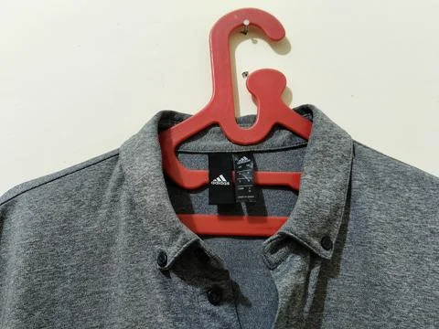 Central Java Indonesia 16 August 2026: Close-up of a gray Adidas collared polo  Stock-Fotos