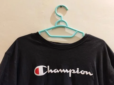 Central Java Indonesia 16 August 2026: Casual youth T-shirt featuring an embroid Stock-Fotos