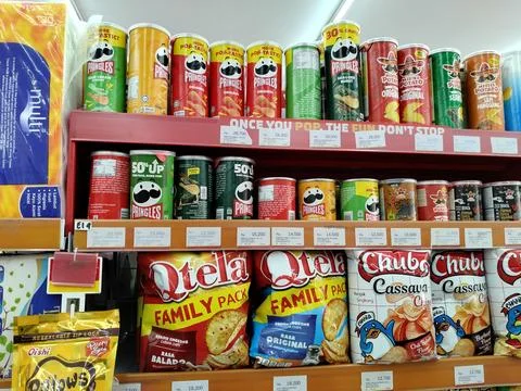 Central Java Indonesia 16 October 2026: Rows of popular global and local snack b Fotos de archivo
