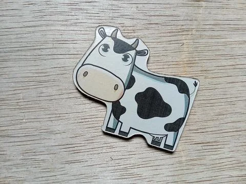 Central Java Indonesia 17 April 2024 : Cow animal character toy. Фото