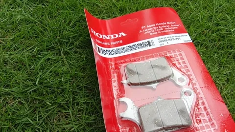 Central Java Indonesia 17 February 2025: Honda motorbike front disc brake lining Stock Footage 303306614