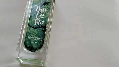 Central Java Indonesia 17 July 2026: Elegant perfume bottle featuring a nature Vídeos de archivo 340120186