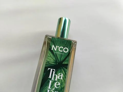 Central Java Indonesia 17 July 2026: Elegant perfume bottle featuring a nature Stock Photos