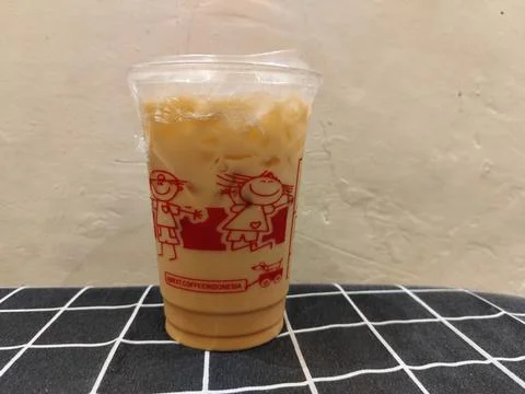 Central Java Indonesia 18 February 2026: Popular iced tea in a takeaway cup Stock Photos