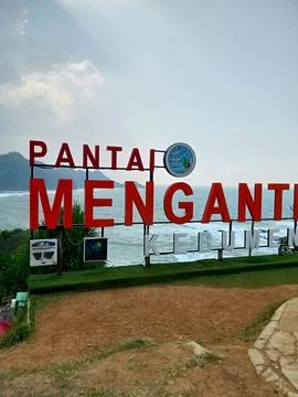 Central Java Indonesia 18 June 2024: landmark sign Menganti beach, Kebumen. 스톡 사진