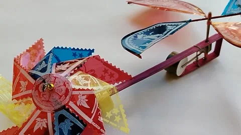Central Java Indonesia 18 May 2026: Bright toy windmill designed for children 스톡 동영상 336289396