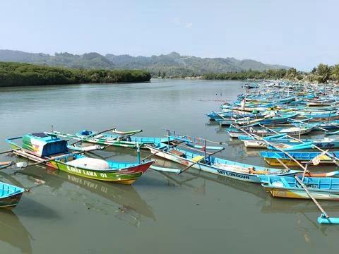 Central Java Indonesia 19 June 2026: A traditional wooden boat rests Stock-Fotos