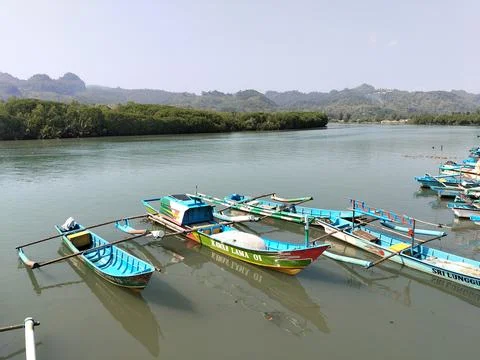 Central Java Indonesia 19 June 2026: A traditional wooden boat rests Stock-Fotos