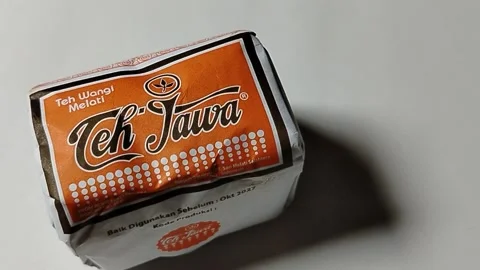 Central Java, Indonesia, 19 May 2026: Unopened pack of Javanese traditional loos Stock Footage 335191881