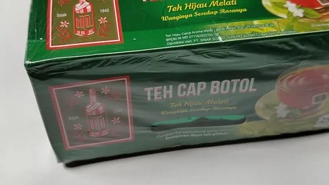 Central Java Indonesia 19 may 2026: Authentic Indonesian Bottle Cap jasmine tea  Stock Footage 335191889