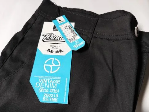 Central Java Indonesia 2 March 2026: New black pants with brand label attached Photos