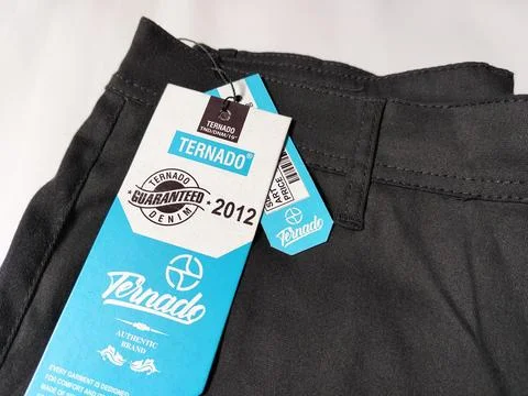 Central Java Indonesia 2 March 2026: New black pants with brand label attached. 스톡 사진