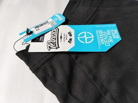 Central Java Indonesia 2 March 2026: New black pants with brand label attached Photos