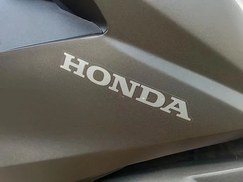Central Java Indonesia 2 November 2023: Honda writing on the motorbike body. Stock Photos
