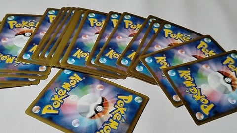 Central Java Indonesia 22 April 2026: Back side of Japanese Pokémon TCG card fea Video stock 333503638
