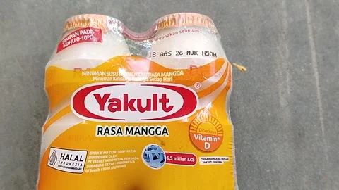 Central Java Indonesia 22 July 2026: A refreshing bottle of Yakult Mango flavore Stock Footage 340330978