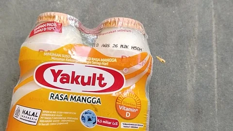 Central Java Indonesia 22 July 2026: A refreshing bottle of Yakult Mango flavore Stock Footage 340330980