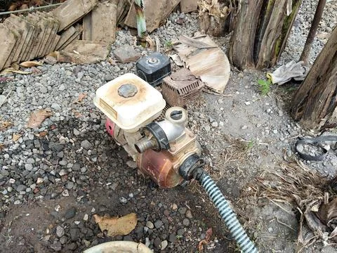 Central Java Indonesia 22 July 2026: Portable diesel water pump machine used for Stock Photos