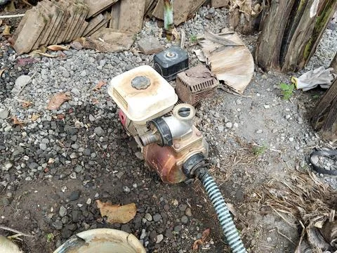Central Java Indonesia 22 July 2026: Portable diesel water pump machine used for Stock Photos