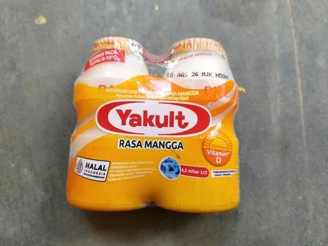 Central Java Indonesia 22 July 2026: A refreshing bottle of Yakult Mango flavore Stock-Fotos