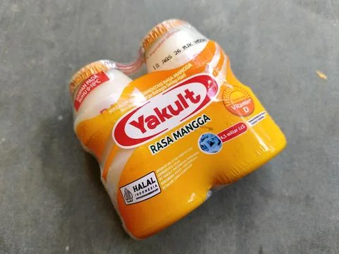 Central Java Indonesia 22 July 2026: A refreshing bottle of Yakult Mango flavore Stock-Fotos