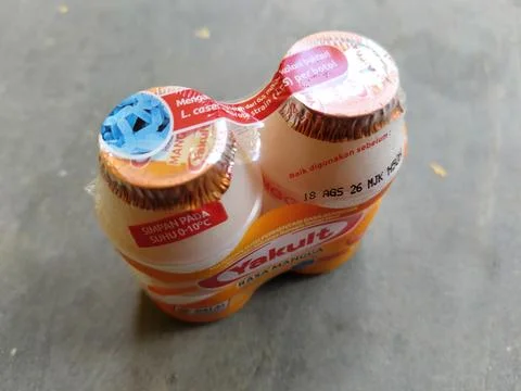 Central Java Indonesia 22 July 2026: A refreshing bottle of Yakult Mango flavore Stock Photos
