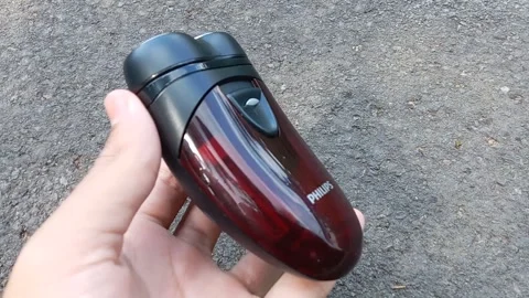 Central Java Indonesia 22 June 2024: electric mustache and beard shaver. Stock Footage 279273314