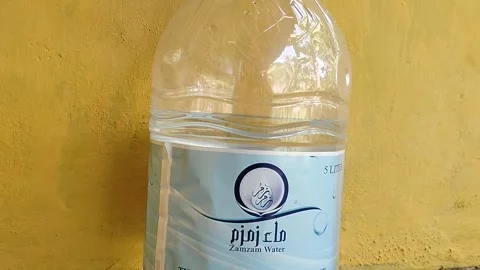 Central Java Indonesia 22 June 2026: Officially labeled 5-liter Zamzam water  Stock Footage 337502365